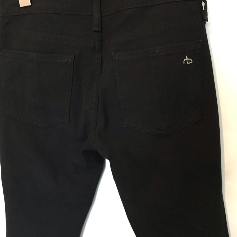 Black raw cut leg jeans
